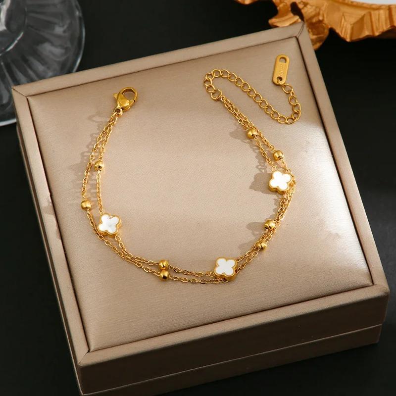 

Минималистичный мини двухсторонний браслет из титановой стали с четырьмя листьями клевера, удачная трава, универсальное элегантное украшение для рук 6658-Gold White