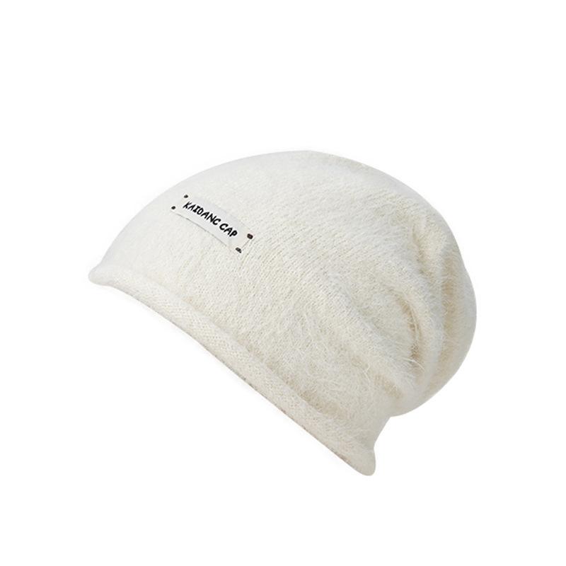 Herbst und Winter neue Stapelmützen Kinder lockeres Gesicht kleine Baotou-Mütze Ohrenschützer kalte Mütze flauschige warme Überziehmütze
