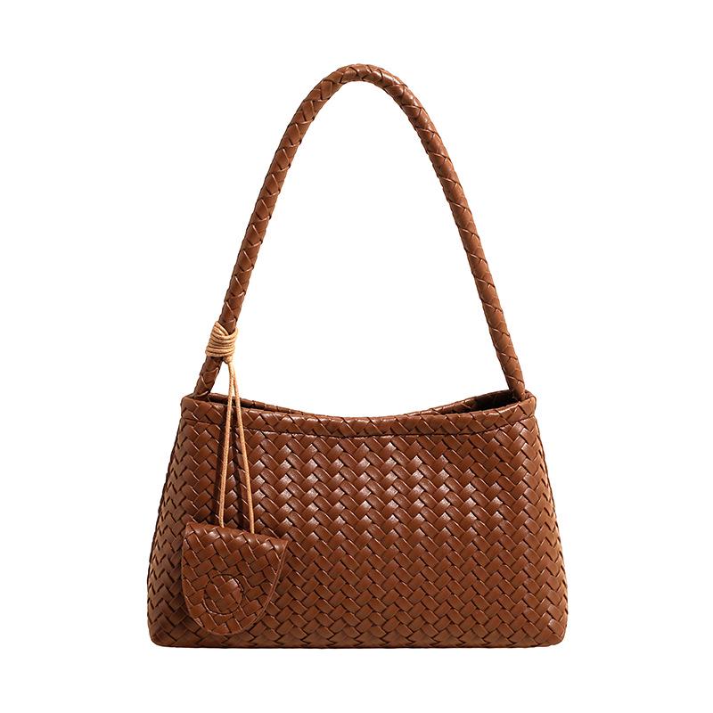 Elegant French Woven Pattern Baguette Women's Shoulder Bag 2026