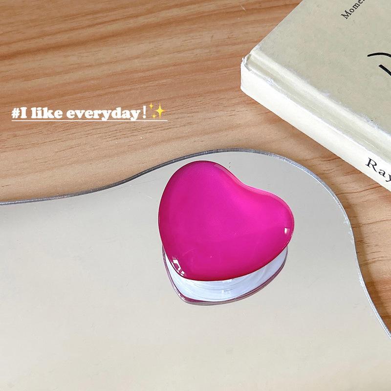 

Korean Heart-Shaped Glass Sticker & Phone Airbag Holder - Portable Stand for Watching Dramas.