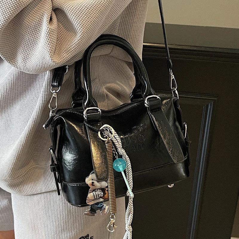 Korean Version of the New High-end College Temperament Portable Pillow Bag Women's Leisure Commuting Versatile Messenger Boston Bag