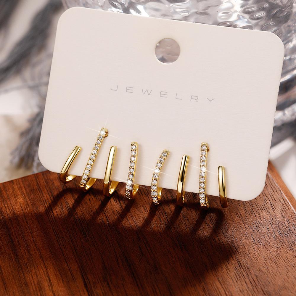 Brincos de Argola Quatro Garras, Design de Nicho Celebridade da Internet Brincos de Clipe de Orelha Mulheres, Moda Brincos de Pino Quatro Garras Maré