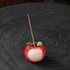 Celadon Lychee Incense Holder: Creative Small Sandalwood Burner with Kitten Ornament for Tea Table.