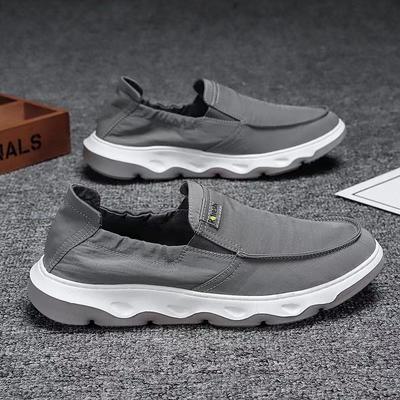 Nouvelles chaussures de skate pour hommes Automne Chaussures d'extérieur tendance antidérapantes Mode respirante plates Mocassins en toile décontractés pour hommes Zapatos Homme