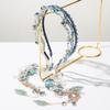 Sophisticated and Light-hearted Detachable Fringed Crystal Bow with Leaf Design Hairband, A Charming Wedding Hair Accessory.
