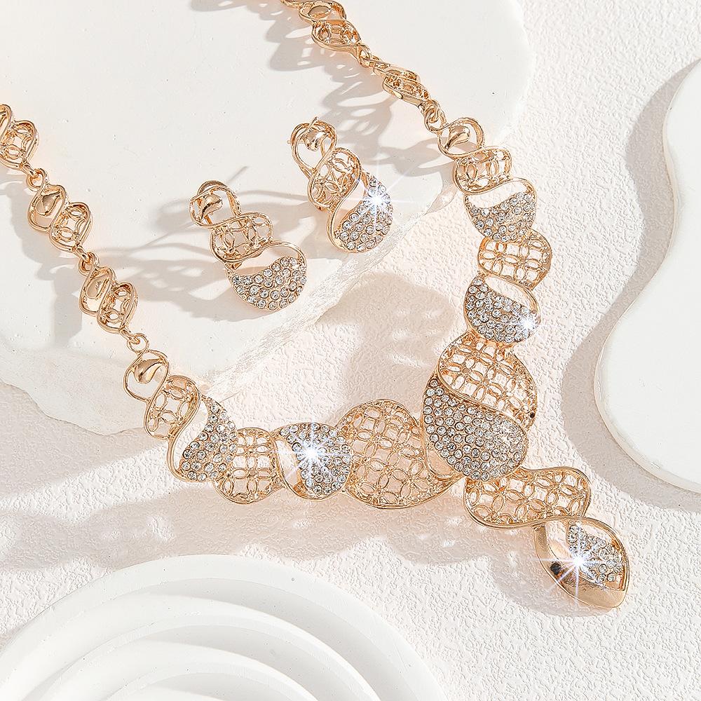 Gold Zinc Alloy Inlaid White Rhinestone Hollow Necklace Earrings Set Women's Jewelry