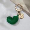 Neuer farbenfroher Leder-Herz-Schlüsselanhänger - Niedliches Legierungspendant-Accessoire