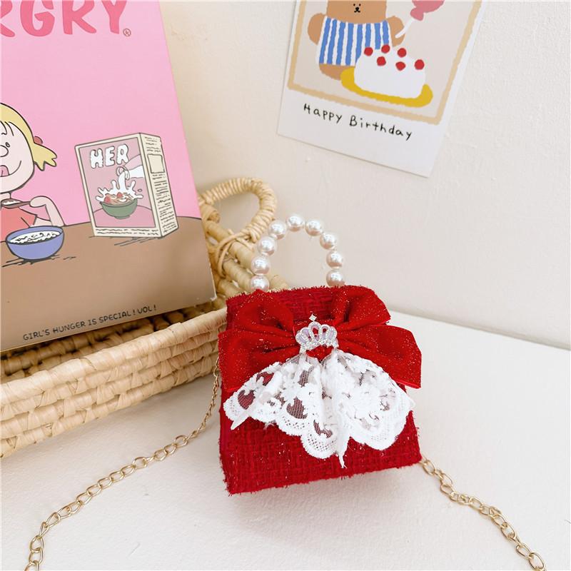 Stylish And Cute Red Pearl Handbag For Girls Featuring Adorable Butterfly Bow Accent