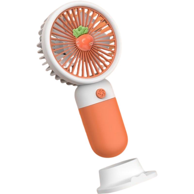 

Держатель для мобильного телефона Ручной вентилятор Открытый портативный мощный ветер Мини Креативный настольный фруктовый электрический вентилятор оранжевый