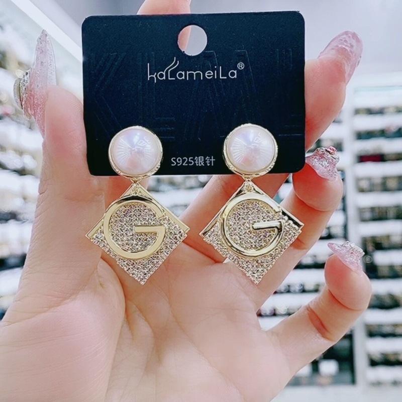 Fashion Geometric Bow Flower Pearl Earrings Women'S Premium Versatile Small Fragrant Wind Earrings