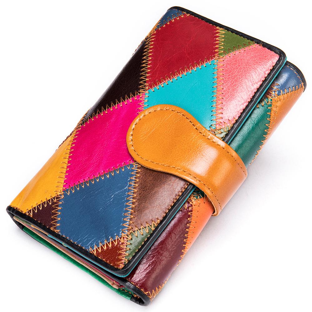 WESTAL Damen Geldbörse aus echtem Leder - Farb-Patchwork und Rautenmuster orange