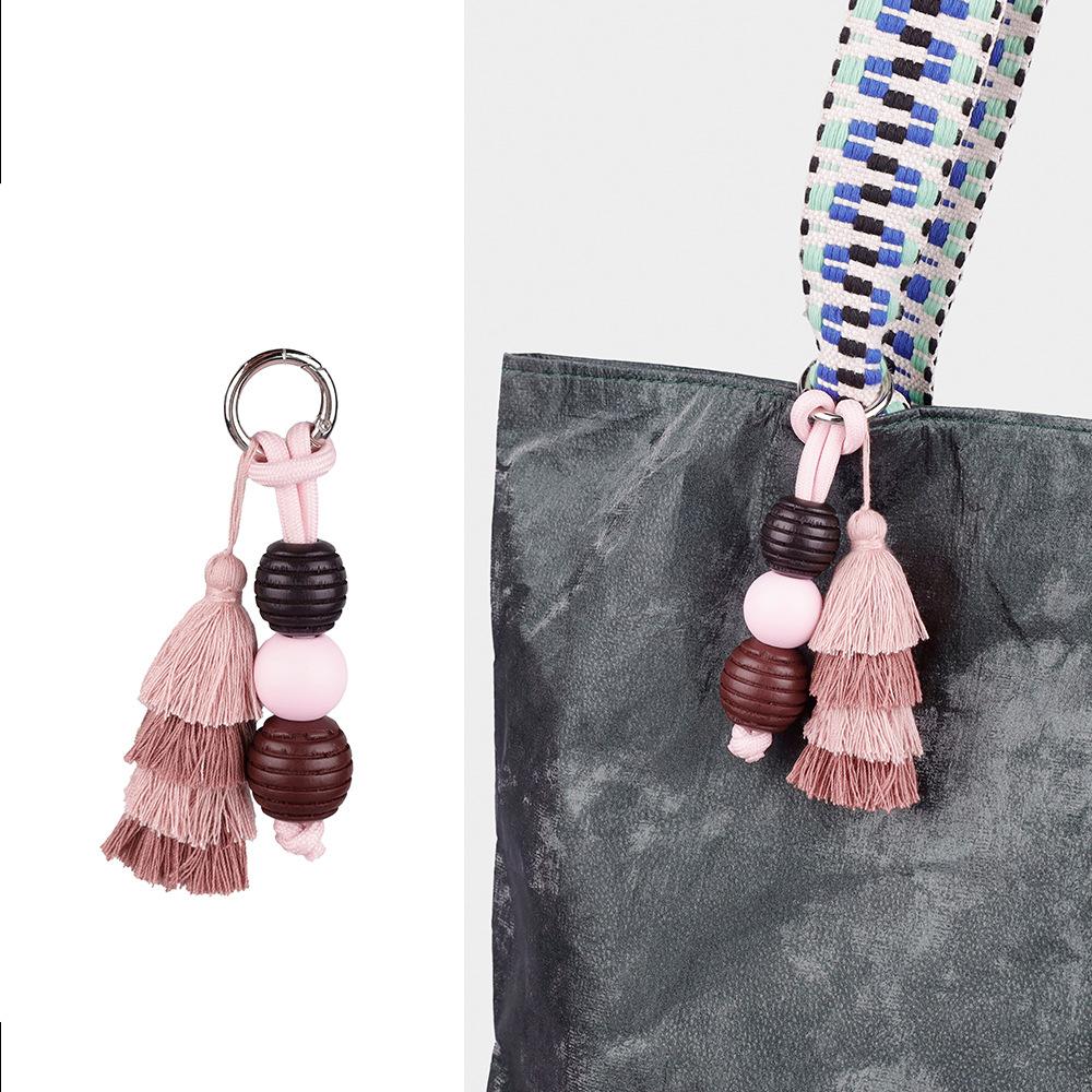 Hochwertiger Taschenanhänger mit niedlichem Ball und Dopamin-Quaste, fester Schlüsselanhänger-Zubehör, vielseitige kreative Mode-Serie