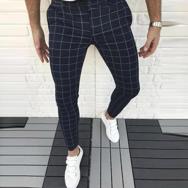 

Модные мужские повседневные универсальные брюки узкого кроя со средней талией и принтом на ножках M темно-синий