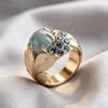 Magnifique Bague pour Femme Inlaid Cubic Zirconia Bleu Couleur Or Esthétique Sculpture à la Main Feuille Port Quotidien Bijoux de Soirée Cadeau d'Anniversaire