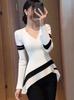 Exquisite Black Patchwork V-neck Long Sleeve Knit Top for Women - Korean Style, Irregular Slimming Design for Autumn/Winter.