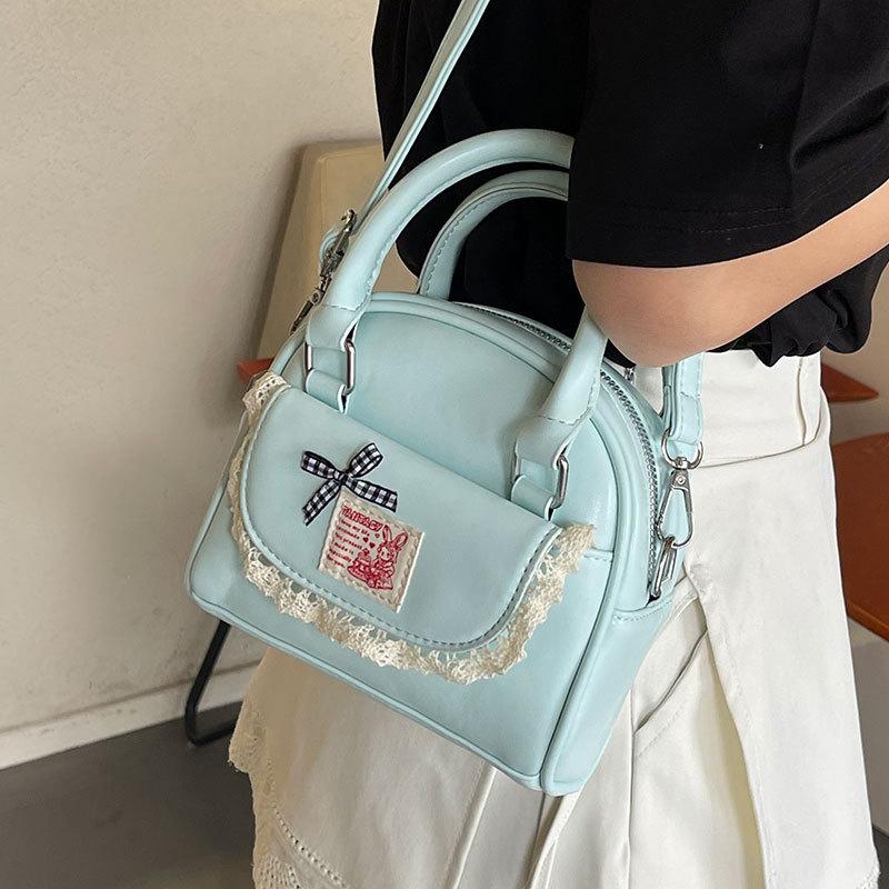 Korean Version of Sweet Ballet Style Dopamine Portable Boston Bag Commuting Versatile High Sense Foreign Style Messenger Women's Bag