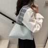 Premium Texture Light Luxury Woven Pattern Underarm Bag Women's 2025 New Temperament Portable Shoulder Bag Commuter Baguette Bag