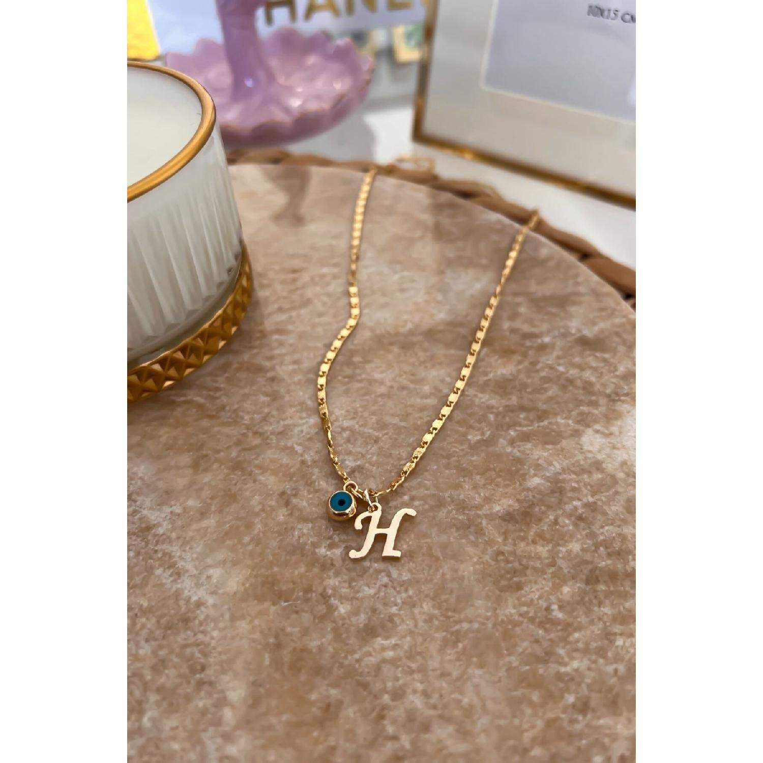 

Намисто на тонкому ланцюжку з літерою H і підвіскою «Лихе око». 50 cm