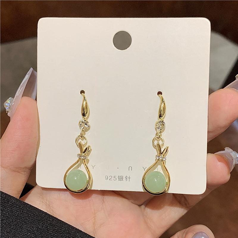 

New Chinese-style antique money bag earrings, earrings, women s retro high-end temperament, versatile lucky bag earrings, earrings.