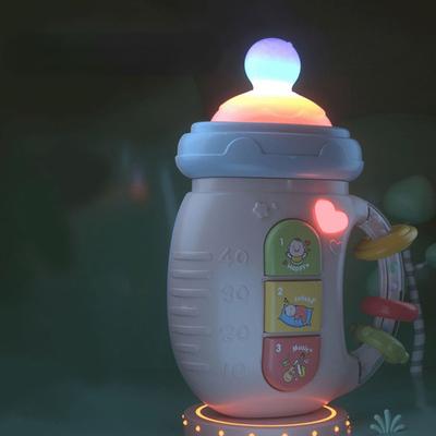 Baby-Musikalische Babyflasche mit Schnuller, Neugeborenen-Beißring, weiche Rasseln, Lernspielzeug, Mobile Rasseln, Spielzeug für 0–12 M, beruhigende Vokalmusik