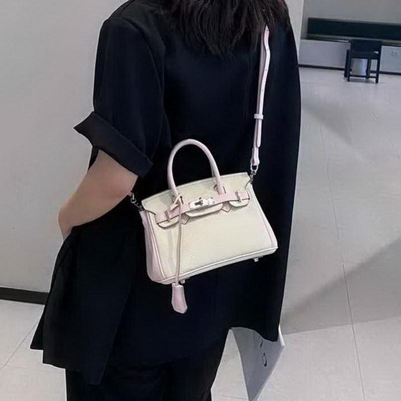 Damentasche aus echtem Leder, farblich passende Tasche aus Togo-Leder mit Top-Grain-Rindsleder, europäische und amerikanische Handtasche für Damen