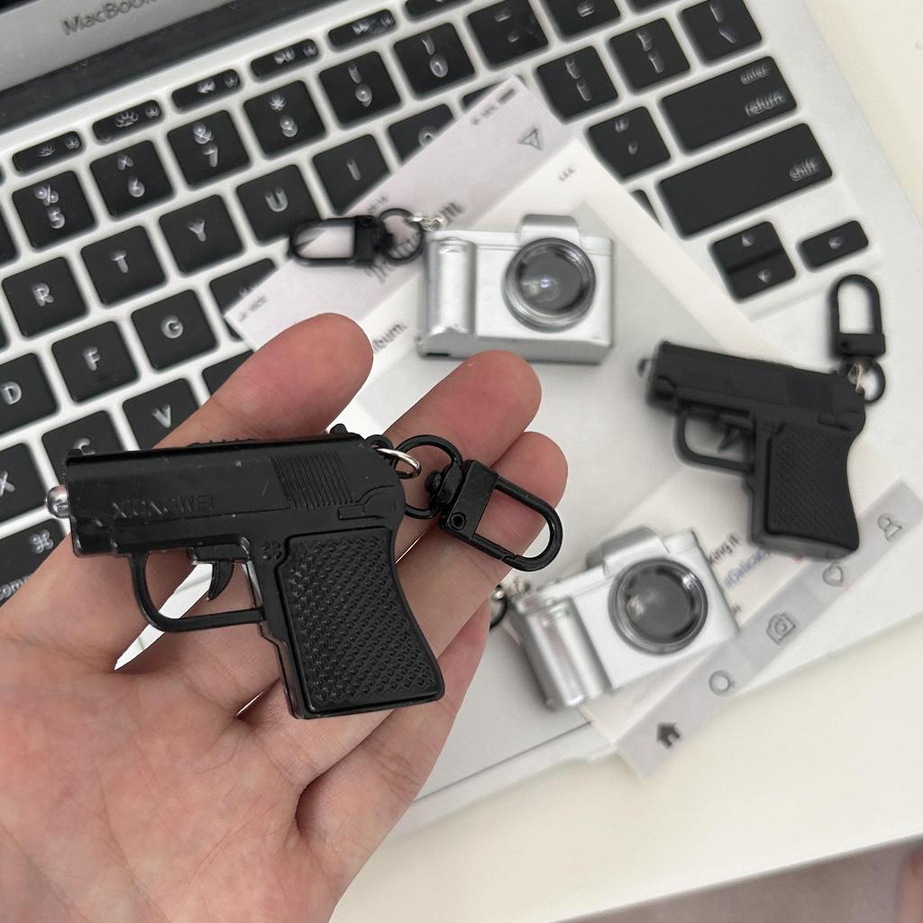 Quirky Personality Gun Toy & Luminous Keychain Camera