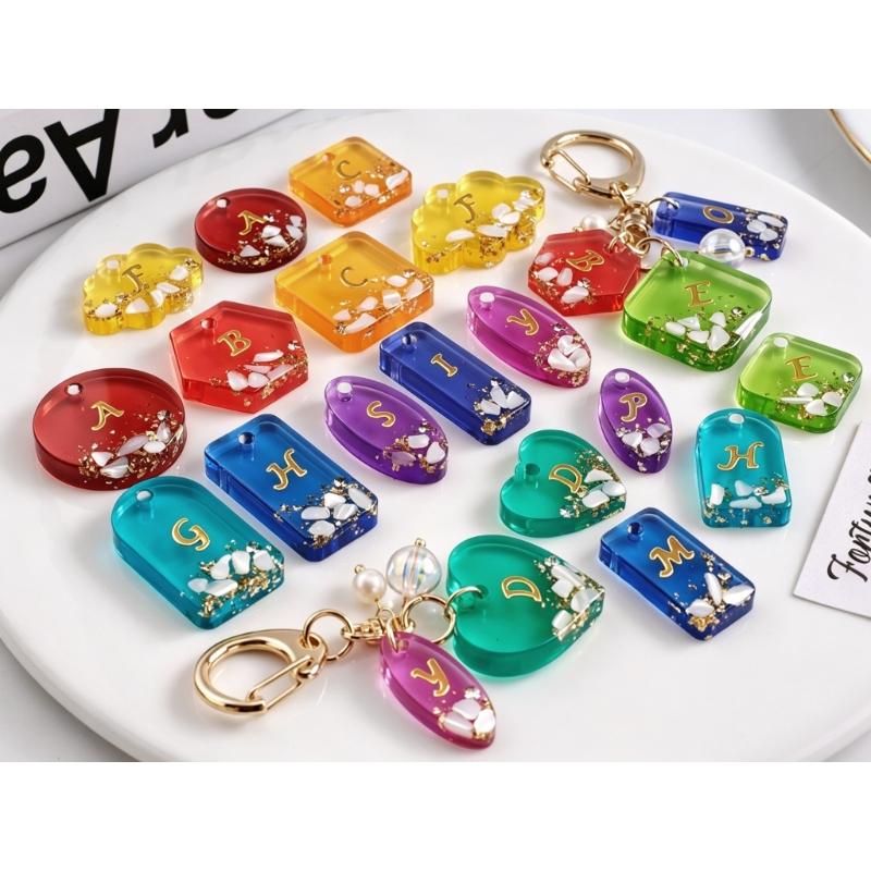 Geometric Pendant Resin Mold, 11-Cavity Silicone Tray with Hanging-Hole Posts for Earrings, Keychains, and Jewelry