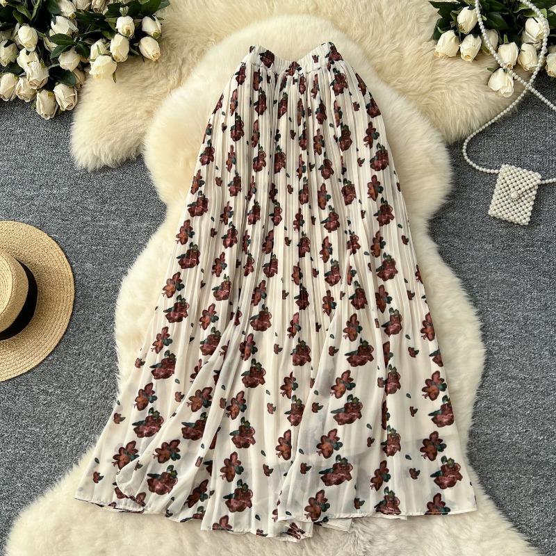 

Юбка из шифона с цветочным узором, нежная и стройнящая, с хорошей драпировкой. Это юбка А-силуэта средней длины. One Size белый