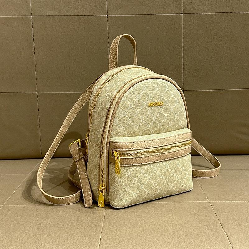 

Женский рюкзак для поездок на работу 2024: Вместительная, стильная дорожная и школьная сумка 22CM*14CM*27CM слоновая кость