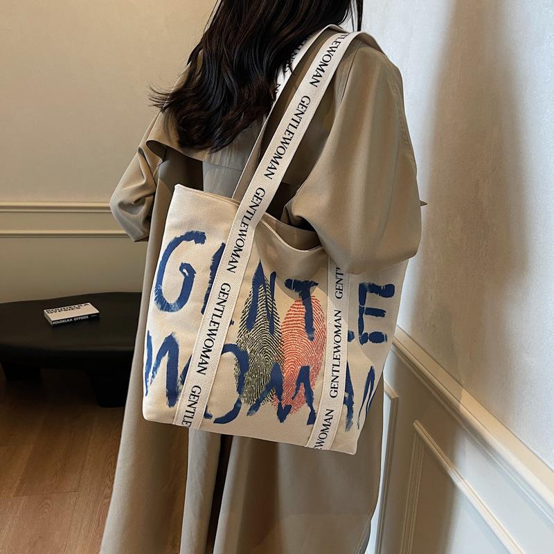 Canvas bag women's 2025 new shoulder bag casual large-capacity Korean version student schoolbag literary and leisure handbag bag