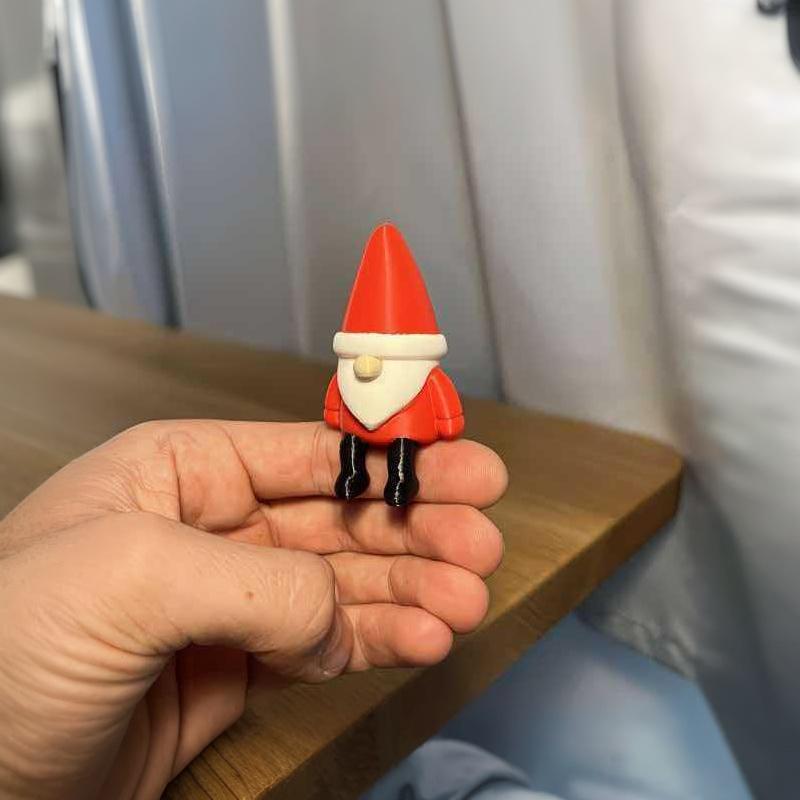 Cute 3D Printed Christmas Gnome Figurine With Dangling Legs For Home Holiday Party Decoration