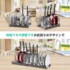 Extendable frying pan rack with 7 compartments, perfect for storing pans, pots, lids, and cutting boards.