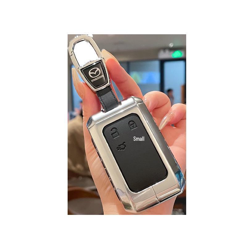 Kuooo: Durable, Fully Enclosed Cover with Buckle for Mazda EZ6 Key Fobs and EZ60 Car Remotes.
