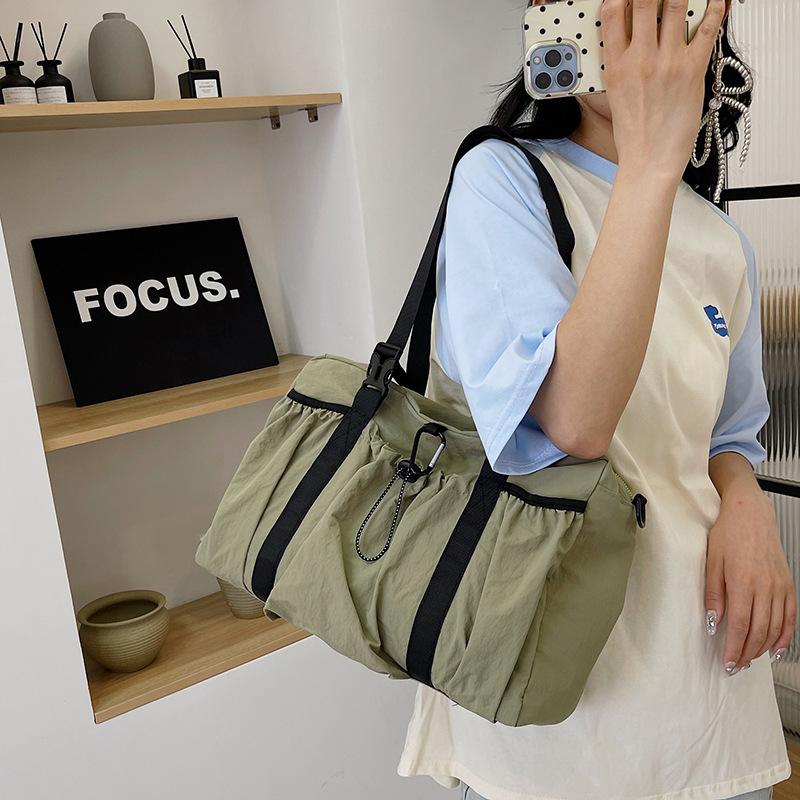 Travel bag Large capacity leisure lightweight business trip boarding aircraft bag Premium sense tote bag Fitness sports storage bag