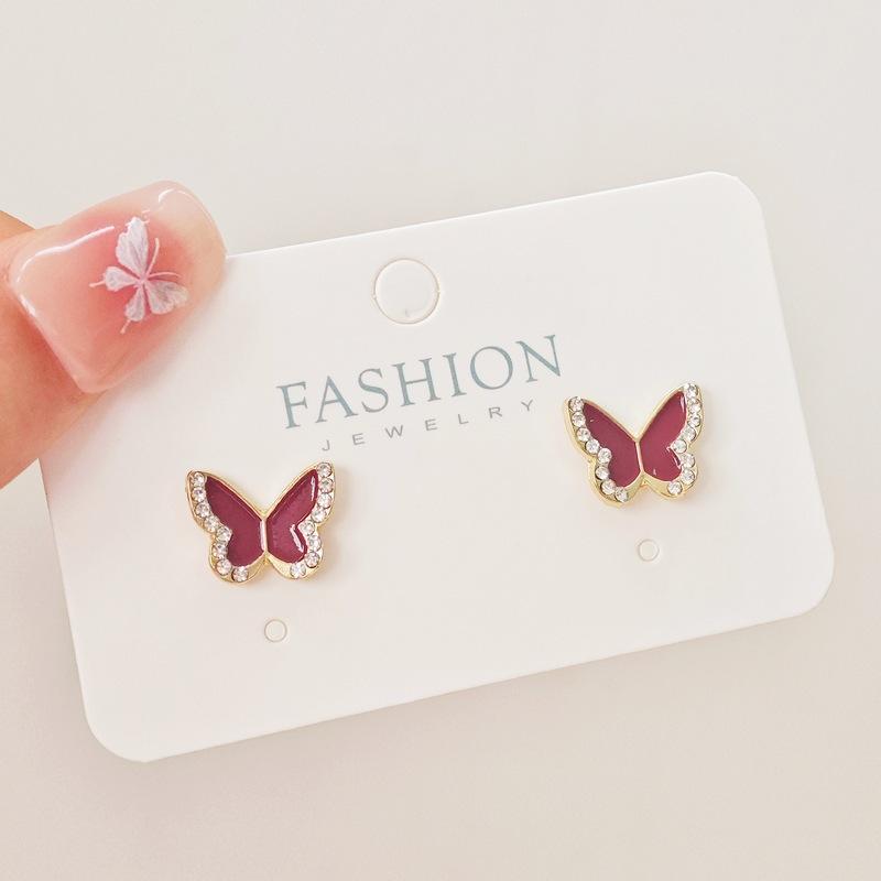 New sweet, cool black, red and white butterfly earrings, niche design, light luxury and high-end earrings.