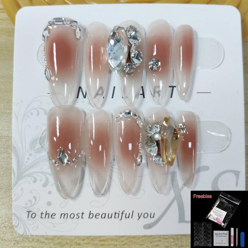 

Длинные миндалевидные ногти ручной работы Носимые искусственные ногти Высококачественный темперамент Королева телесного цвета Цветущие бриллианты Многоразовые и съемные ногти Накладные ногти L