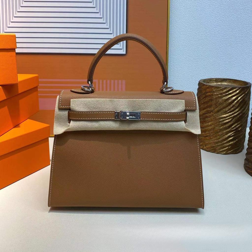 Grenzüberschreitende Hersteller Großhandel Damenhandtaschen 2023 neue Handtaschen aus Leder mit Palmenmuster tragbare Schulter-Umhängetaschen Damenhandtaschen große Kapazität