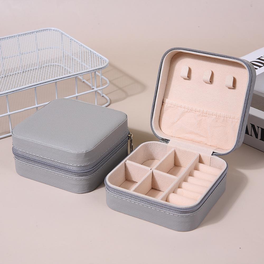 Mini-Schmuckaufbewahrungsbox, Reise-Schmuckschatulle für Ohrringe und Halsketten, kompakte Ringverpackung, Reißverschluss, Clamshell-Schmuckschatulle