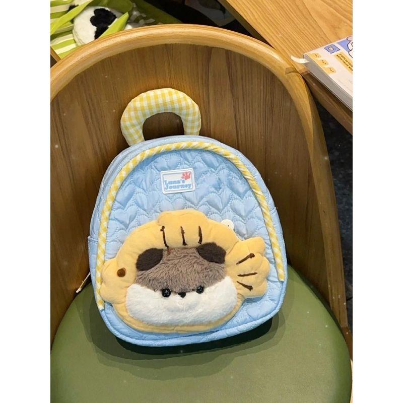 

It is super cute! INS Style Good-looking Cute Kitten Backpack Otter Plush Doll Bag All-Match Backpack Women Yellow croaker cat