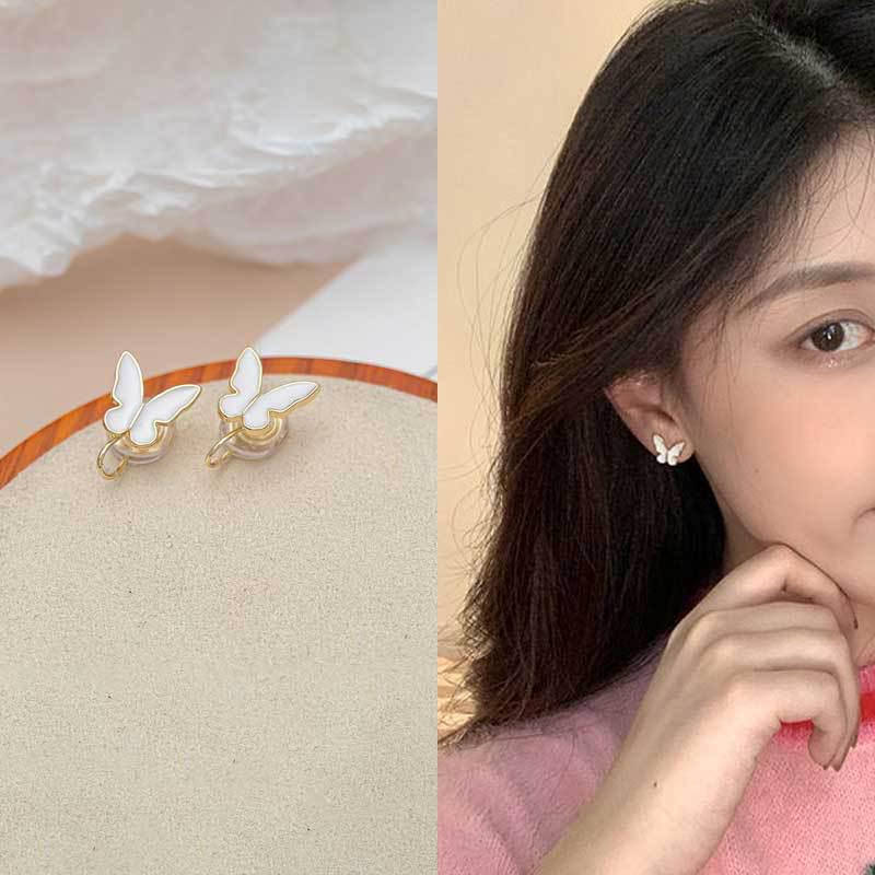 Koreanischer Stil Nicht-Piercing Ohrclip mit langem Quaste, Perlmutt Schmetterlings Design für Damen - High-End, Coole Mode.