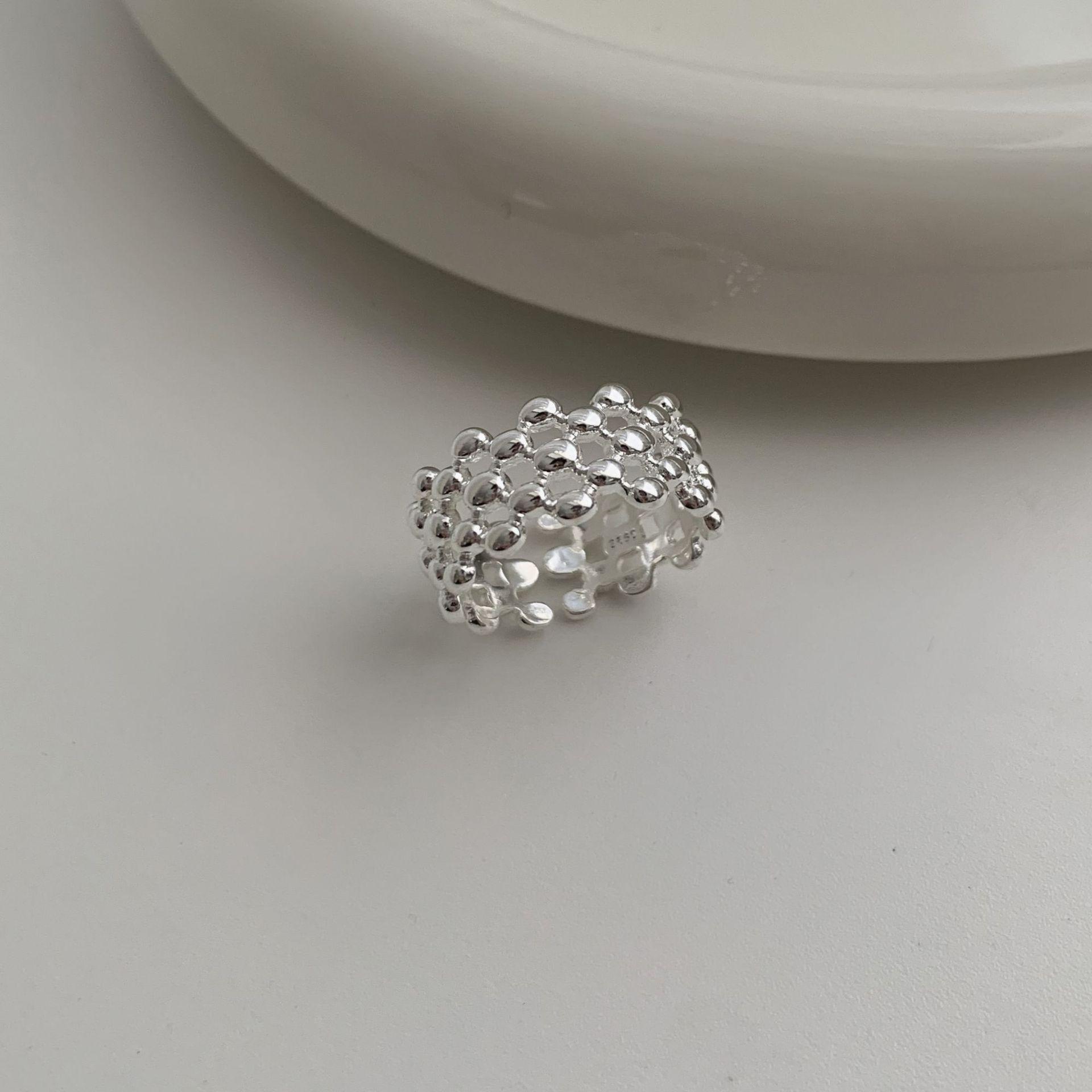 Elegant Geometric Hollow Flower Ring: Versatile, Stackable Beaded Design for Women s Fashion Adjustable