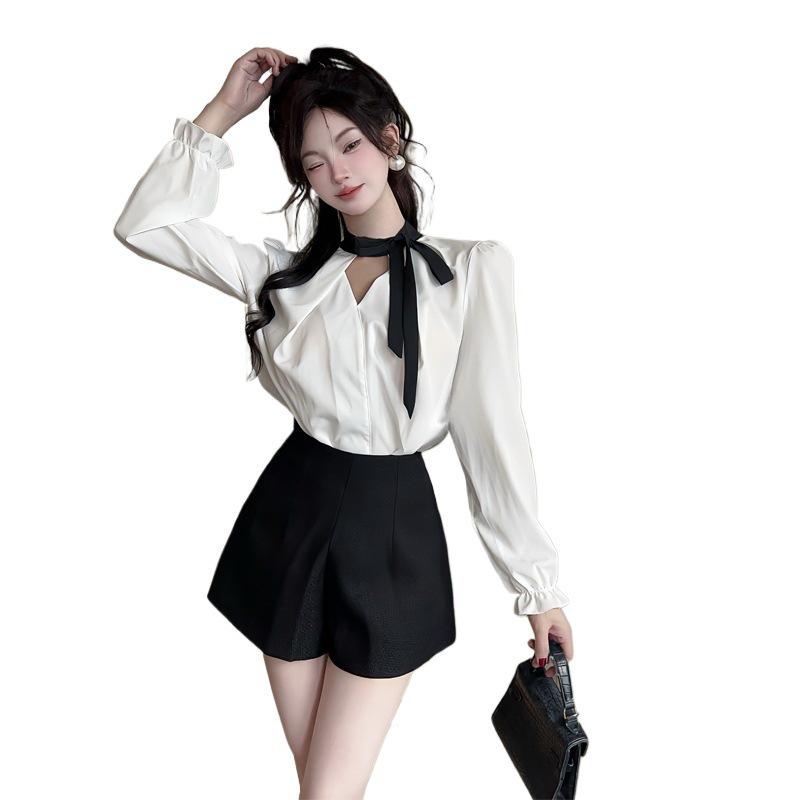 Chic Black & White French V-Neck Bow Shirt with High-Waisted Shorts Set