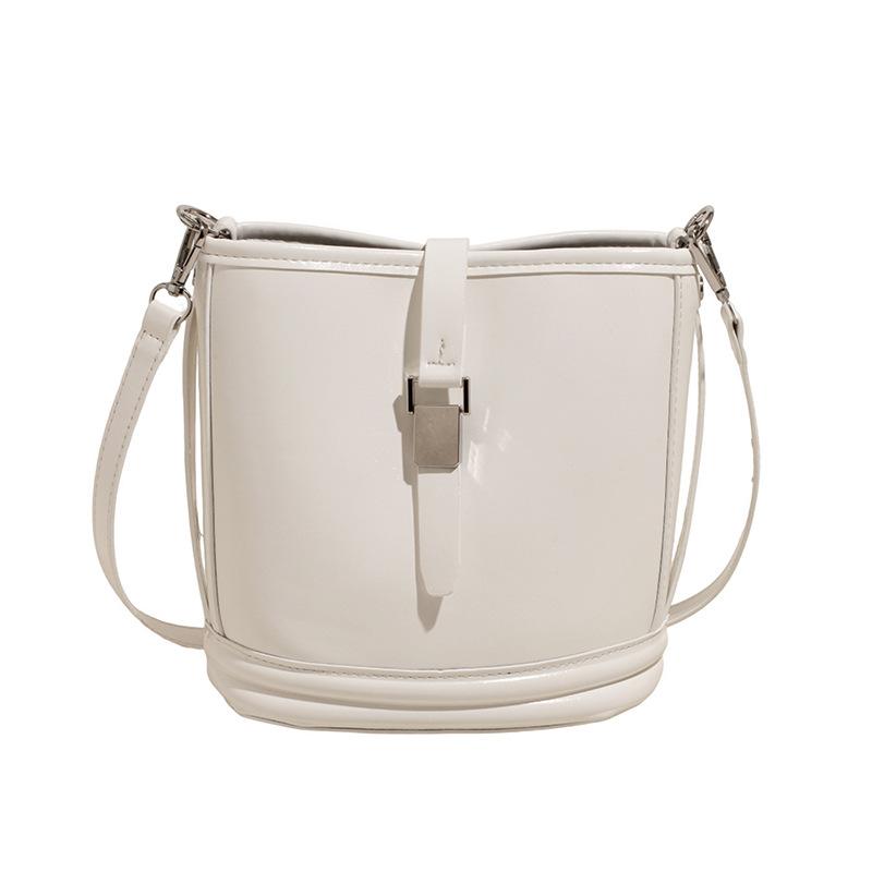 Korean new product, sweet and light color, gentle wind temperament bucket bag, women's commuting versatile and advanced messenger bag
