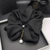 Elegant Retro Pearl Hair Tie: Versatile & Stylish Ponytail Holder 2025