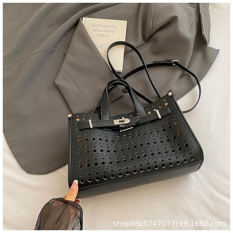 High-end cut-out handheld tote bag for women 2025 new fashion design large-capacity commuter mother-in-law bag crossbody bag