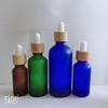 Brown Glass Essential Oil Bottle with Bamboo Lid and Dropper for Cosmetics