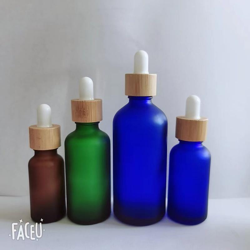Brown Glass Essential Oil Bottle with Bamboo Lid and Dropper for Cosmetics