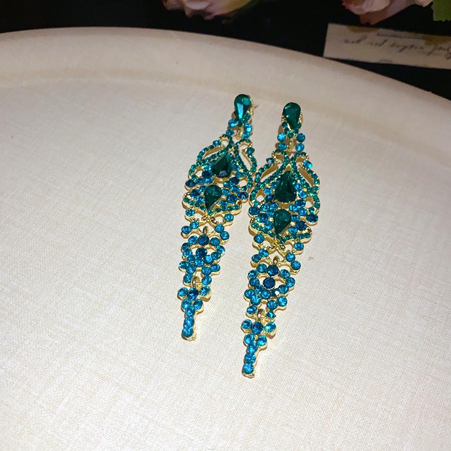 Silver needle with diamonds hollow water drop fringed earrings retro court style elegant earrings light luxury high-end earrings