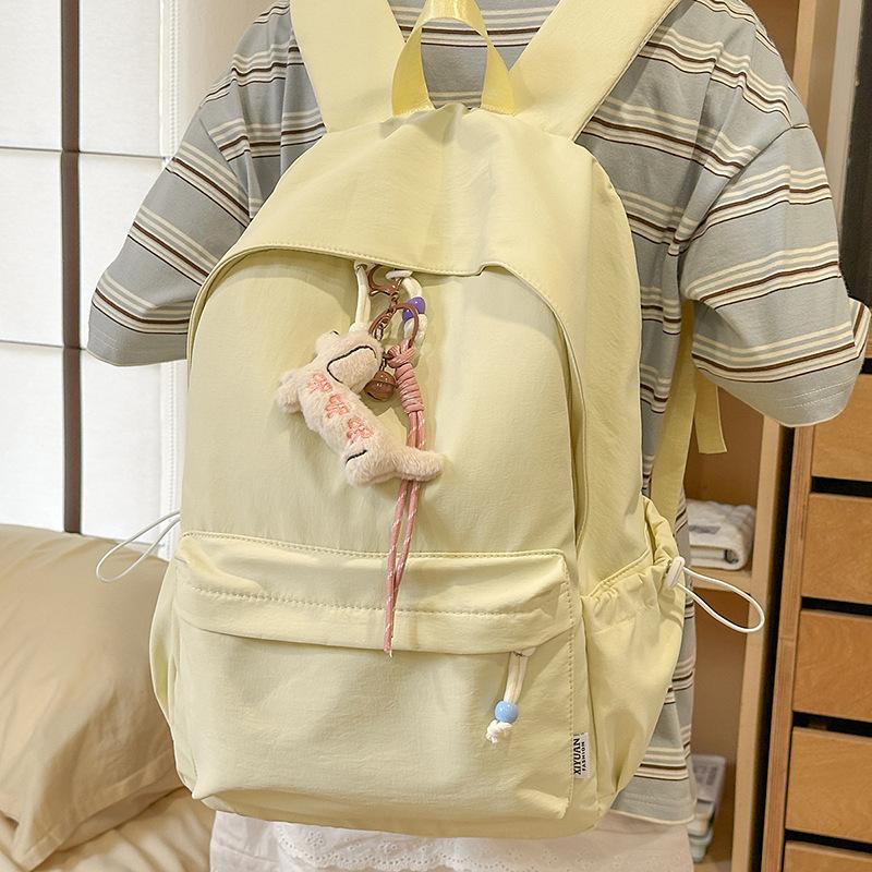 New small fresh schoolbag, high-capacity solid-color backpack for junior high school girls, high-value backpack for primary school students