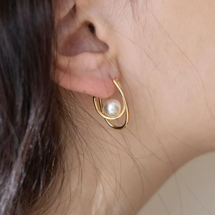 curling pearl earrings